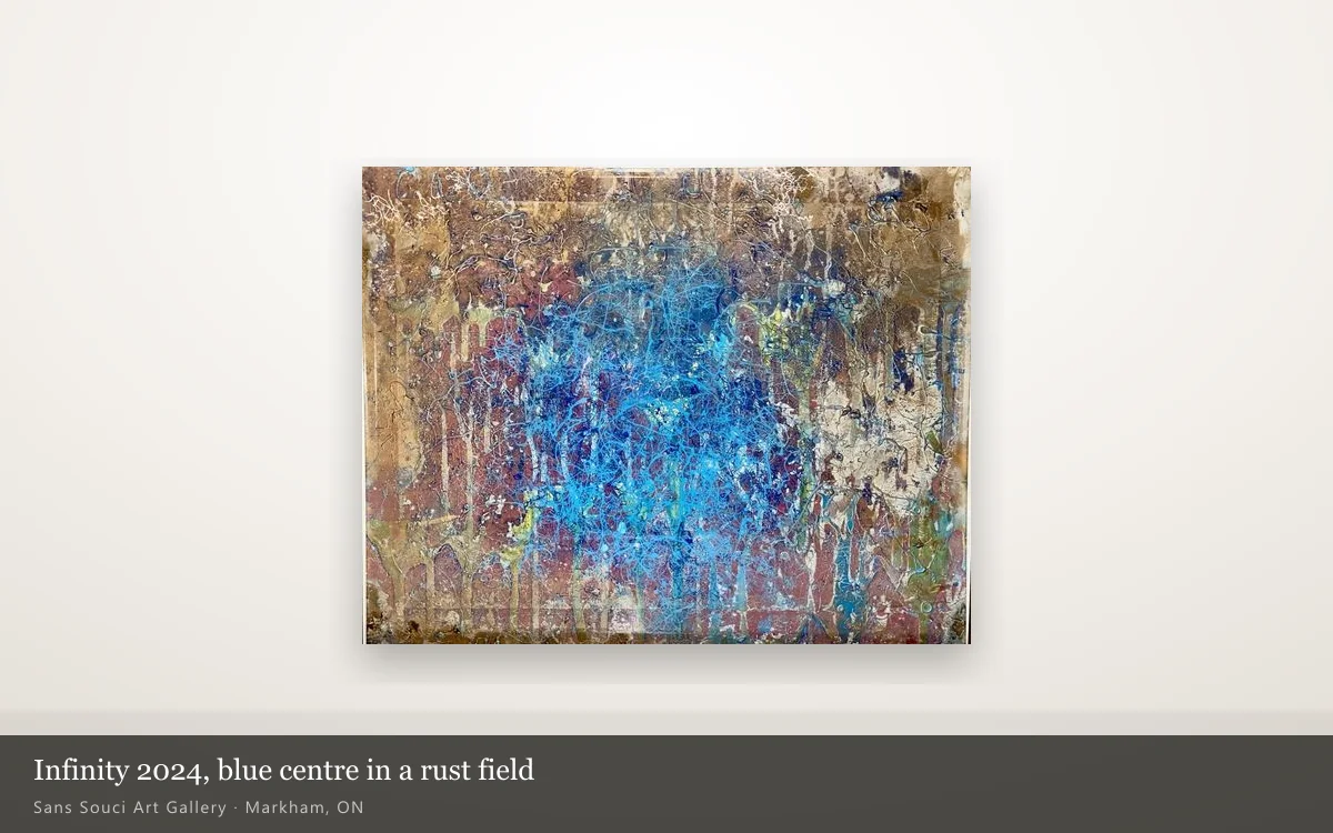 Infinity (2024) hung whole on a lit gallery wall, a blue tangled centre in a rust and cream field